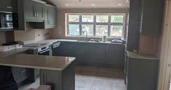 New kitchen extension. Knock through kitchen diner, re-plastering, new electrics, country stone flag flooring, new kitchen units